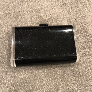 Edie Parker black glitter clutch